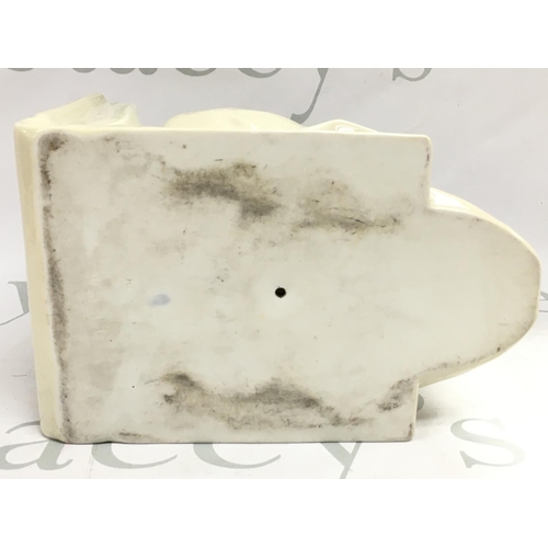 1055 - A rare Hungarian Herend ceramic skull bookend, no obvious damage or restoration . This lot cannot be... 