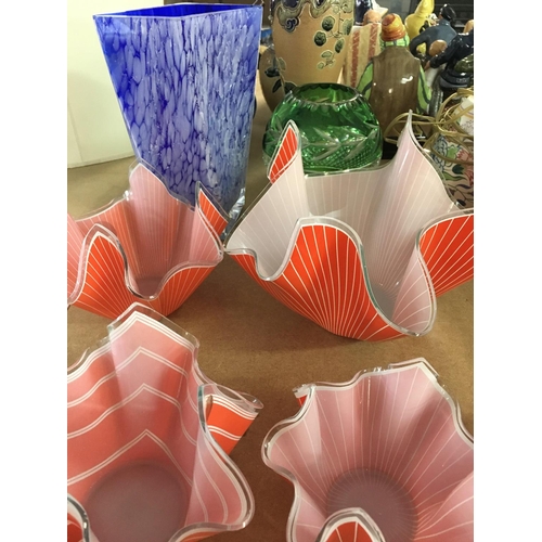 1063 - A collection of glass ware including four handkerchief vases and two vases .