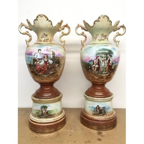 1064 - A pair of Victorian vases decorated with hand painted panels of classic scenes and pink rose designs... 