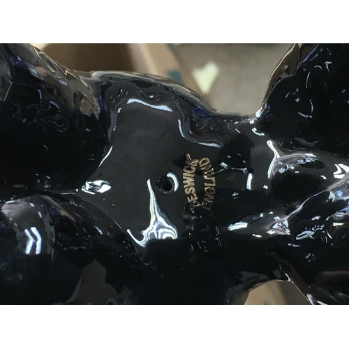 1071 - Four porcelain dog figures including Beswick, Sylvac and Royal Doulton. This lot cannot be posted