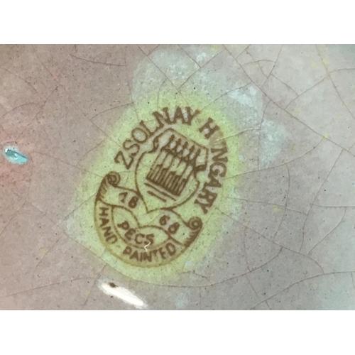 1072 - A collection of Zsolnay Pecs lustre glazed pottery Figures and a jug. This lot cannot be posted