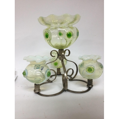 1078 - A glass and silver plated epergne inset with with four green opaque glass bowls having Art nouveau I... 