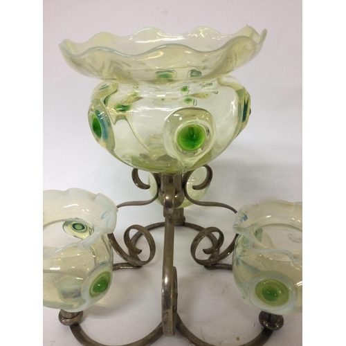 1078 - A glass and silver plated epergne inset with with four green opaque glass bowls having Art nouveau I... 