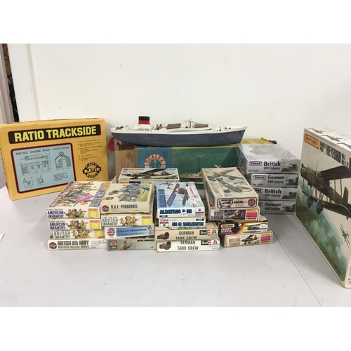 Collection of boxed model sets featuring aircraft and soldiers by ...