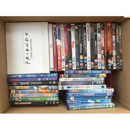 Three boxes of DVDs comprising many TV series and films.