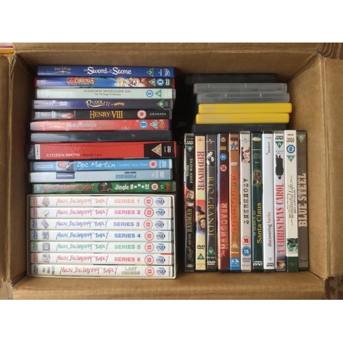 Three boxes of DVDs comprising many TV series and films.