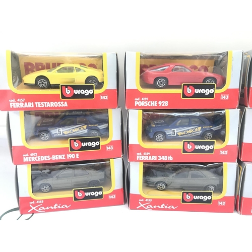 101 - A Collection Of 9 Burago 1/43 Scale Diecast Cars.