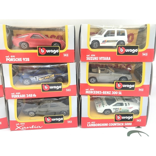 101 - A Collection Of 9 Burago 1/43 Scale Diecast Cars.