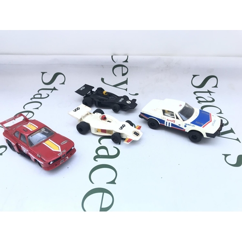120 - 4 Vintage Scalextric Cars And A Collection of Track and Controllers.