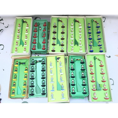 A Collection Of 23 Subbuteo Teams And Some Accessories and Pitch. (2).