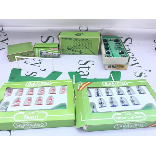 A Collection Of 23 Subbuteo Teams And Some Accessories and Pitch. (2).