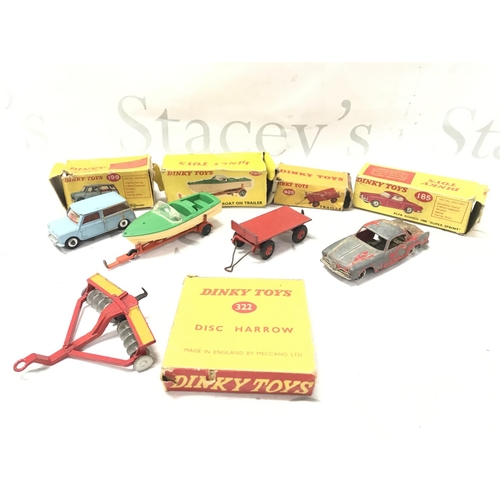 63 - 5 Boxed Playworn Dinky Toy. Boxes Are Worn. A Austin Seven #199. A Healey Sports Boat On Trailer #79... 
