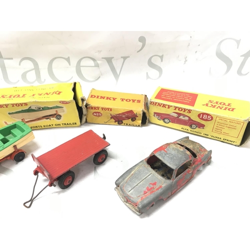 63 - 5 Boxed Playworn Dinky Toy. Boxes Are Worn. A Austin Seven #199. A Healey Sports Boat On Trailer #79... 