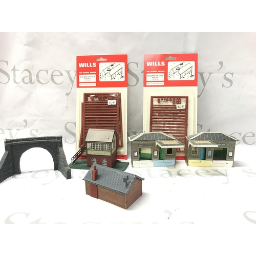 67 - A Collection of 00 Gauge Locos. Wagons. Coaches. Buildings Etc.