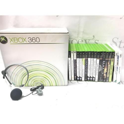 76 - A Boxed Microsoft Xbox 360 with A Collection Of Games.