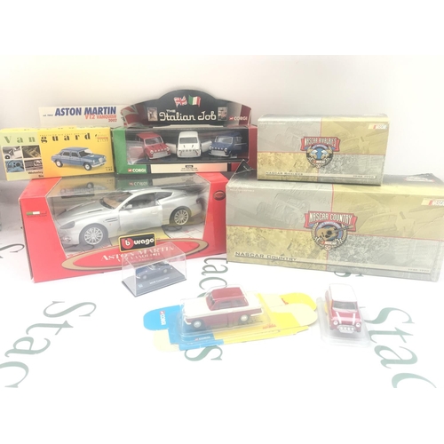 94 - A Collection of Boxed Diecast Including Burago. Corgi. Vanguards And NASCAR.