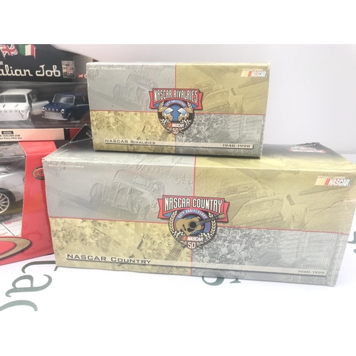 94 - A Collection of Boxed Diecast Including Burago. Corgi. Vanguards And NASCAR.