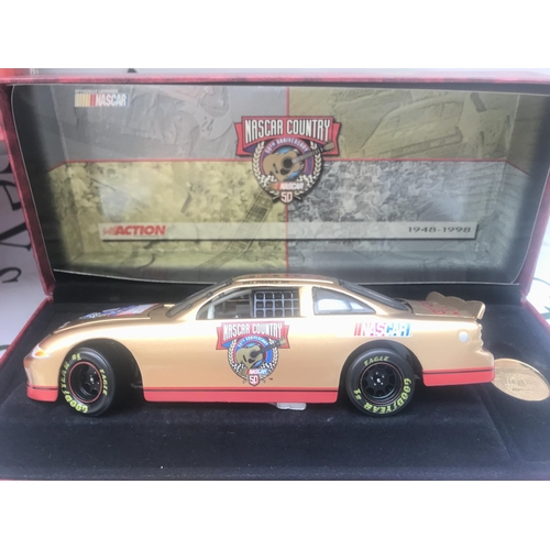 94 - A Collection of Boxed Diecast Including Burago. Corgi. Vanguards And NASCAR.