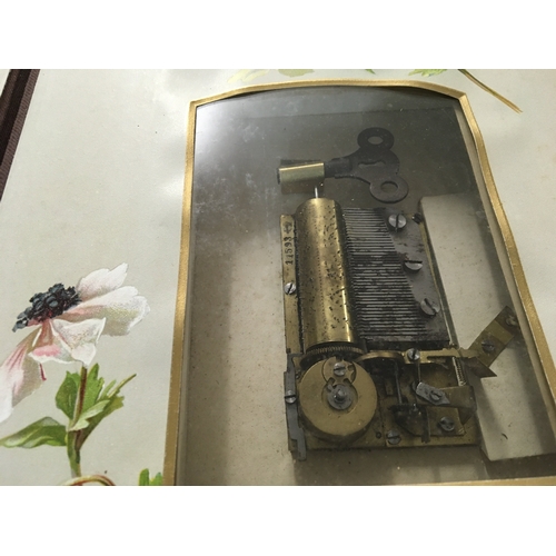 810 - A Victorian photo Album inset with a music box .- NO RESERVE