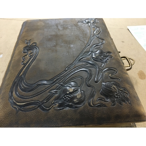 810 - A Victorian photo Album inset with a music box .- NO RESERVE