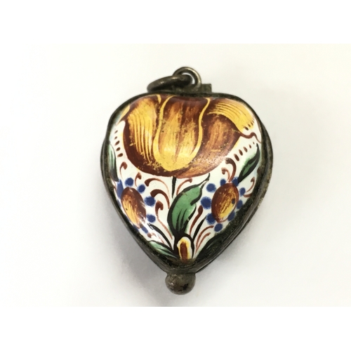 825 - A Victorian Bilston enamel pendant box. Postage category A