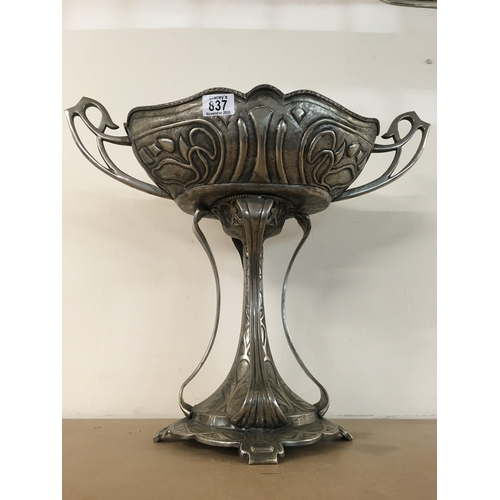 837 - An Art Nouveau style silver plated jardiniere with stylised twin handles and traditional stylised de... 