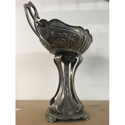 837 - An Art Nouveau style silver plated jardiniere with stylised twin handles and traditional stylised de... 