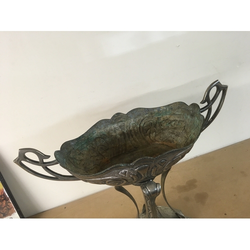 837 - An Art Nouveau style silver plated jardiniere with stylised twin handles and traditional stylised de... 