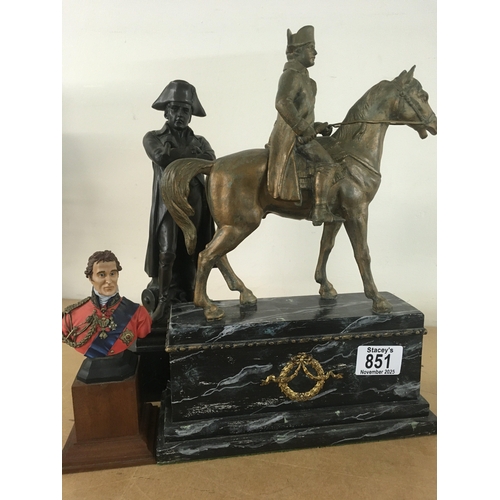851 - A brass figure of Napoleon on horse back mounted on a simulated marble base Together with a bronzed ... 