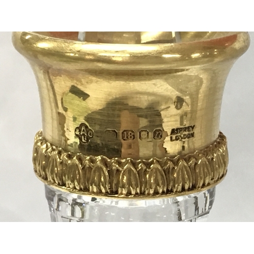 869 - A pair of fine quality 18ct gold rim and cut glass Asprey decanters ,33cm tall. This lot cannot be p... 