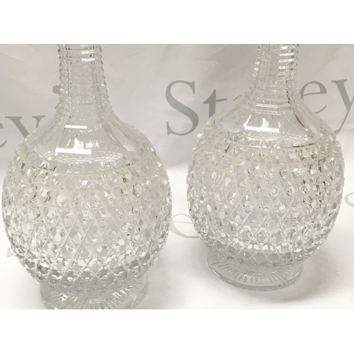 869 - A pair of fine quality 18ct gold rim and cut glass Asprey decanters ,33cm tall. This lot cannot be p... 