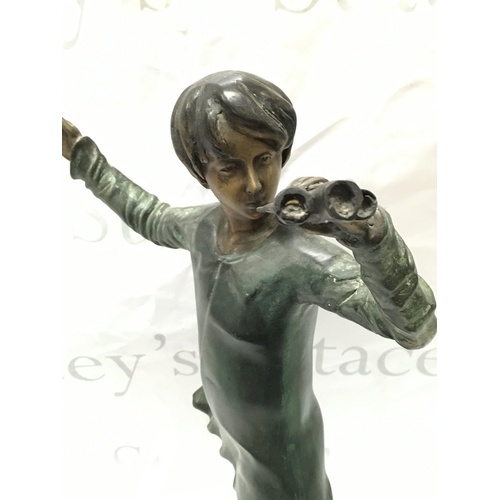 877 - A bronze figure