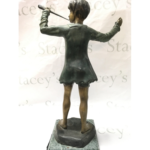 877 - A bronze figure