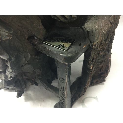 890 - A limited edition simulated cold browned cast figure seated lady with a certificate of authenticity ... 