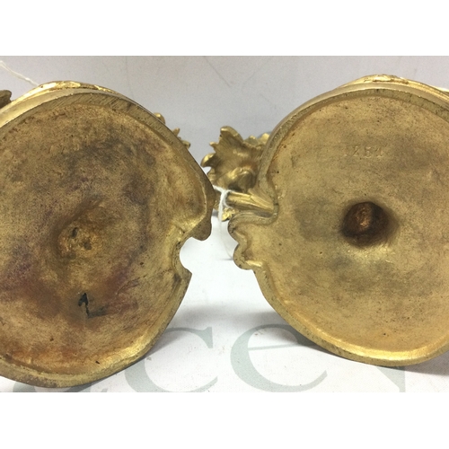 893 - A pair of French ormoulo candelabras, approximately 15cm tall. 21cm wide. Postage category c