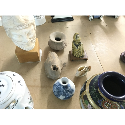 910 - A Chinese blue and white porcelain bowl with lid along with other oriental items. Postage D. NO RESE... 