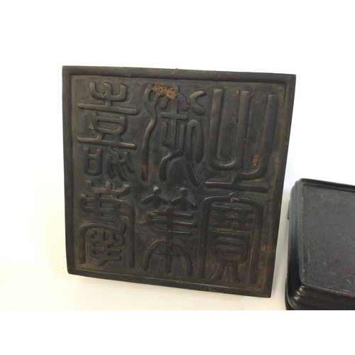 915 - Two Chinese wooden and stone Fu dog stamp seals. 6 and 15cm tall. Postage category B