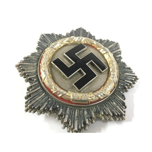 A Third Reich German cross and a Hitler youth honour badge . Postage ...