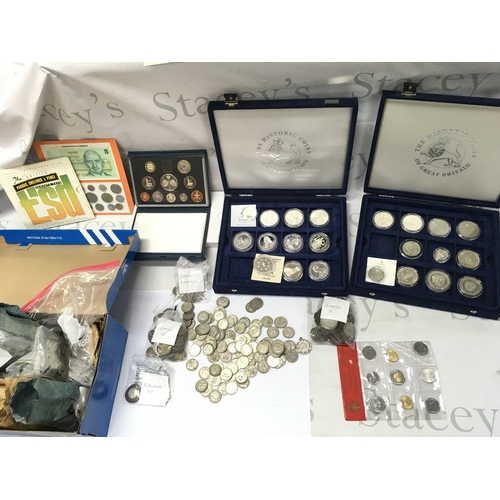A large collection of assorted world coinage including sterling silver ...