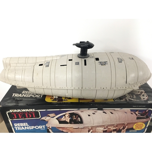 23 - A Boxed Vintage Star Wars The Return Of The Jedi Rebel Transporter. Complete With Instructions.