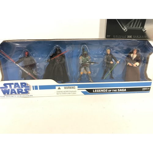 26 - A Boxed Star Wars Legends Of The Saga Set And Star Wars DVD Box Set.