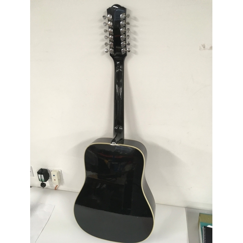 1050 - An Ibanez E684 12 string acoustic guitar and stand (2). No case.