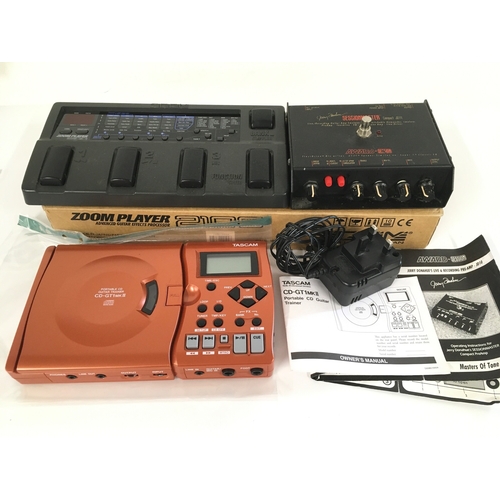 1054 - A Jerry Donahue Session Master guitar emulator pre amp pedal with instructions, a boxed Zoom 2100 gu... 