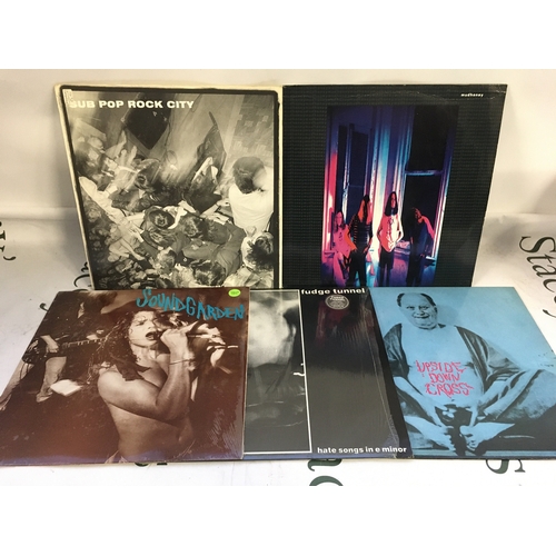 18 - Five grunge LPs and EPs comprising a blue marbled pressing of Screaming Life by Soundgarden, a Sub P... 
