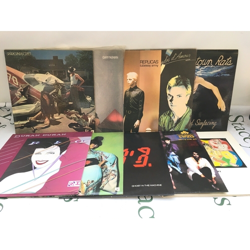 229 - A record case containing rock and pop LPs by various artists including Sparks, Duran Duran, Tubeway ... 