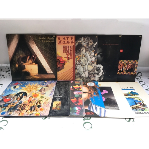 306 - Two bags containing 23 rock & pop LPs and 12