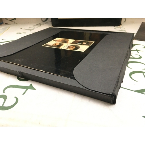 320 - A first UK pressing of The Beatles Let It Be LP complete with outer slipcase, tray and Get Back book... 