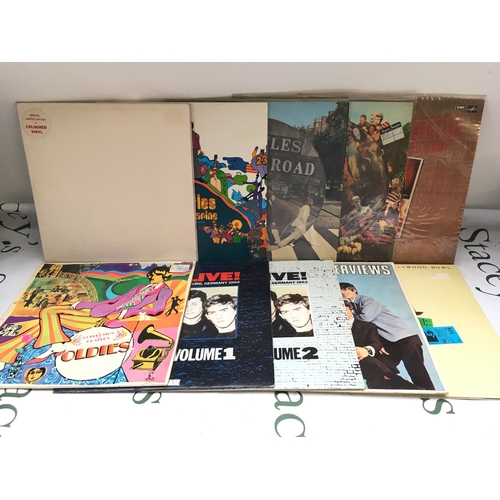 324 - Ten Beatles LPs comprising a yellow vinyl Yellow Submarine, a white vinyl White Album, Abbey Road pi... 