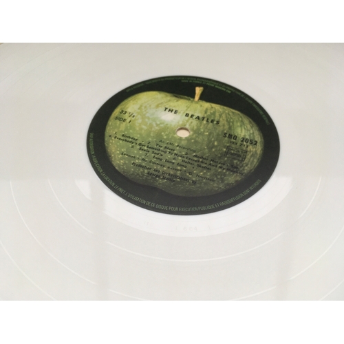 325 - Five Beatles LPs comprising two coloured vinyl pressings of Sgt Pepper, a French white vinyl pressin... 