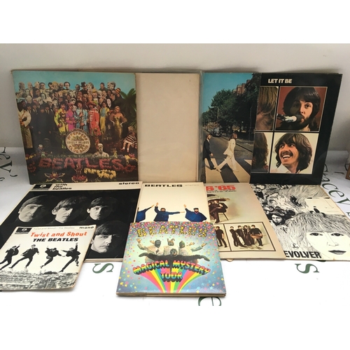 328 - Eight Beatles LPs and two EPs including foreign pressings including Beatles 65, Let It Be and others... 